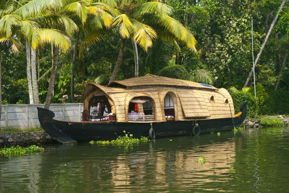 backwaters of Kerala,Houseboats are houses that are built on top of long and widely-built boats